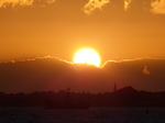 FZ019512 Sunset over lighthouse boat Harwich harbour.jpg